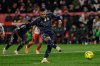 Real Madrid's Kylian Mbappe scores a penalty kick during a Spanish La Liga soccer match between Girona and Real Madrid, in Girona, Spain, Sunday, Nov. 30, 2025. (AP Photo/Joan Monfort)
