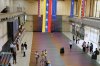 Travelers wait in the main hall of the Simon Bolivar Maiquetia International Airport in Maiquetia, Venezuela, Sunday, Nov. 13, 2025, after several international airlines canceled flights following a warning from the U.S. Federal Aviation Administration about a hazardous situation in Venezuelan airspace. (AP Photo/Ariana Cubillos)