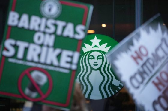 Protesters picket outside a Starbucks on Nov. 13, in Philadelphia. (Matt Slocum / The Associated Press files)