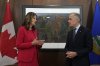 Prime Minister Mark Carney stands with Alberta Premier Danielle Smith at the start of a meeting in Ottawa on Monday, Oct. 6, 2025.  THE CANADIAN PRESS/Adrian Wyld