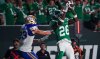 Saskatchewan Roughriders defensive back Tevaughn Campbell (26) intercepts the ball in front of Winnipeg Blue Bombers receiver Dalton Schoen (83) during a two point conversion in the second half of CFL football action in Regina, Sunday, Aug. 31, 2025. THE CANADIAN PRESS/Heywood Yu