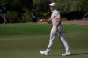 Rory McIlroy of Northern Ireland reacts after a birdie on the 1st hole during the third round of World Tour Golf Championship at Jumeirah Golf Estates, in Dubai, United Arab Emirates, Saturday, Nov. 15, 2025. (AP Photo/Altaf Qadri)