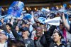 Fans wave flags and towels before the Vancouver Whitecaps and Los Angeles FC play the MLS Western Conference semifinal playoff soccer match, in Vancouver, on Saturday, November 22, 2025. THE CANADIAN PRESS/Darryl Dyck