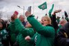 Spectators cheer in front of Mosaic Stadium in Regina, Monday, Nov. 17, 2025. The Saskatchewan Roughriders defeated Montreal Alouettes on Sunday to become the 112th Grey Cup champions. THE CANADIAN PRESS/Heywood Yu