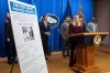 Attorney General Pam Bondi stands near wanted poster for Canadian fugitive Ryan James Wedding as she speaks with reporters during a news conference at the U.S. Department of Justice, Wednesday, Nov. 19, 2025, in Washington. (AP Photo/Mark Schiefelbein)