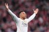 Real Madrid's Kylian Mbappe celebrates after scoring his side's third goal during the Spanish La Liga soccer match between Athletic Bilbao and Real Madrid in Bilbao, Spain, Wednesday, Dec. 3, 2025. (AP Photo/Jose Breton)