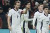 England's Harry Kane, left, celebrates with teammates after scoring his side's second goal during the World Cup 2026 group K qualifying soccer match between Albania and England, in Tirana, Albania, Sunday, Nov. 16, 2025.(AP Photo/Vlasov Sulaj)