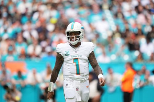 Miami Dolphins quarterback Tua Tagovailoa (1) walks on the field during the first half of an NFL football game against the New Orleans Saints Sunday, Nov. 30, 2025, in Miami Gardens, Fla. (AP Photo/Rebecca Blackwell)