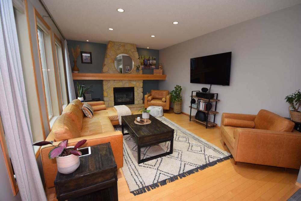 Todd Lewys / Free Press
A gas fireplace with stone surround serves as the focal point of the spacious great room.