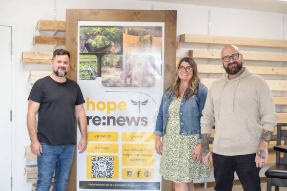 Prairie Barnwood founder and Hope Renews vice-president Blayne Wyton (left), Morden-Winkler MLA Carrie Hiebert (centre) and Hope Renews founder and president Jonathan Heppner, pictured in September at the grand opening of the Hope Renews office in Morden. (Supplied)