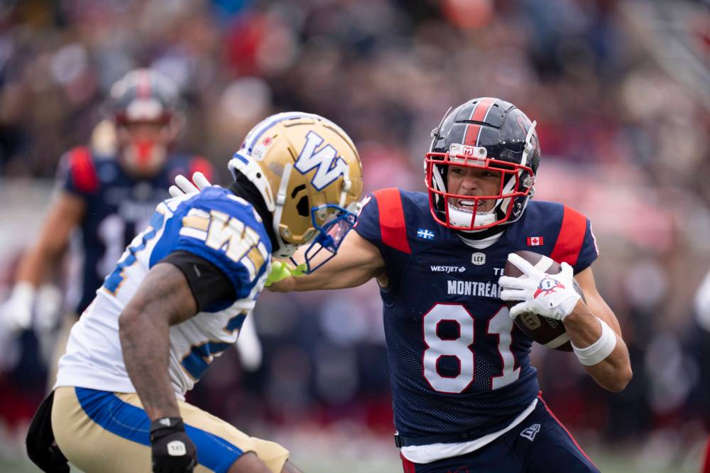 CHRISTOPHER KATSAROV / THE CANADIAN PRESS
Winnipeg Blue Bombers’ Dexter Lawson (27) defends against Montreal Alouettes’ Austin MacK (81) during first half Eastern semi-final action, in Montreal on Saturday, Nov. 1, 2025.