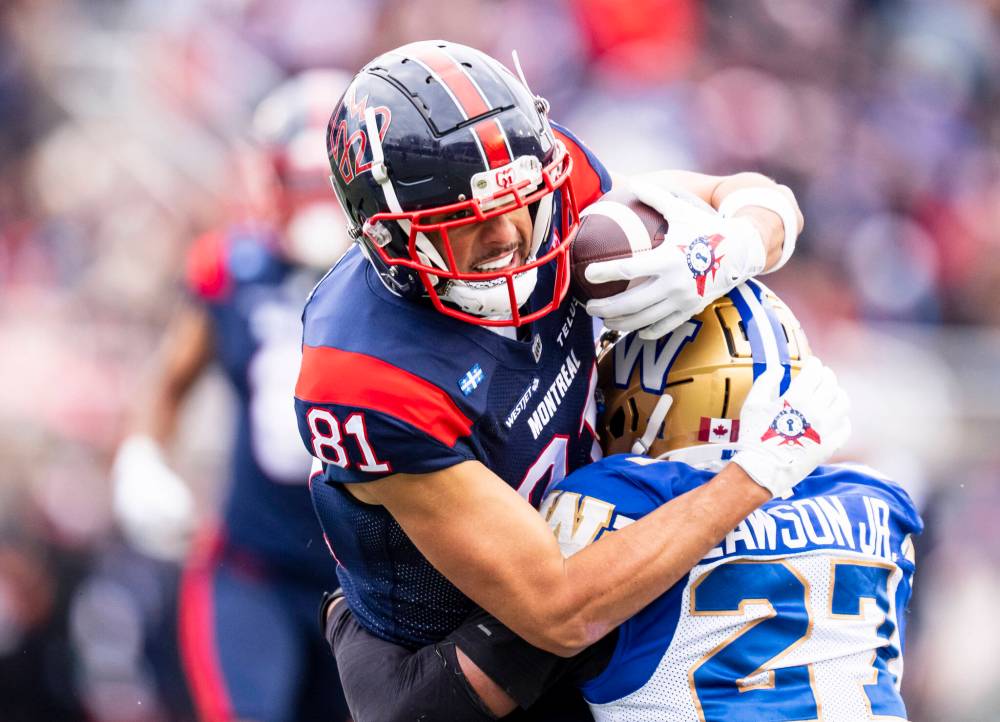 CHRISTOPHER KATSAROV / THE CANADIAN PRESS
Winnipeg Blue Bombers’ Dexter Lawson (27) defends against Montreal Alouettes’ Austin MacK (81) during first half Eastern semi-final action, in Montreal on Saturday, Nov. 1, 2025.