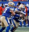 JOHN WOODS / THE CANADIAN PRESS FILES
                                Winnipeg Blue Bombers running back Brady Oliveira (right) said Tuesday he has nothing but good things to say about playing for his hometown club, but that he owes it to himself to find the best place to win another Grey Cup.