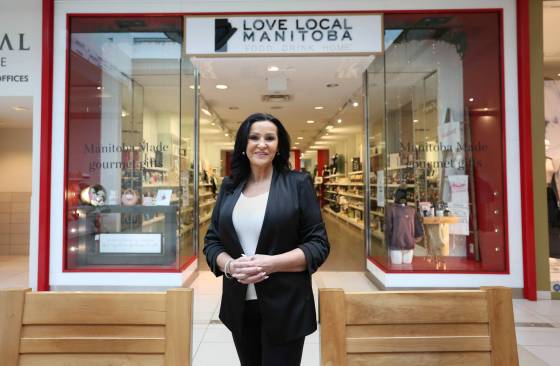 Marlene Hornick, manager of Love Local Manitoba, at the entrance of the store in St. Vital mall. The shop sells products from some 100 local businesses, but now needs a new home. (Ruth Bonneville / Free Press)