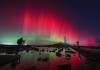 Owen Humphreys/ The Associated Press
                                The aurora borealis glow in the sky over St Mary’s Lighthouse in Whitley Bay on the North East coast, England.