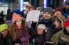 BROOK JONES/FREE PRESS Victoria Diez, 6, holds an 'I Love Santa' sign while she watches the Manitoba Hydro Santa Claus Parade Grey Cup Edition in Winnipeg, Man., Saturday, Nov. 15, 2025. The Santa Claus parade has run annually in Winnipeg since the former Eaton’s department store organized the first one in 1909.