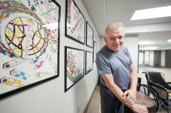 Ruth Bonneville / Free Press
                                Local artist and Riverview resident Andre Hall-Grusska creates intricate geometric designs, often using his bed as a standing desk.