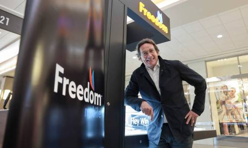 Ruth Bonneville / Free Press BIZ - Freedom Mobile Pierre Karl Peladeau, CEO of Quebecor, is in Winnipeg for launch of Quebecor-owned Freedom Mobile service in Manitoba. Peladeau officially opened the Freedom Mobile kiosk in Polo Park mall with staff at ribbon -cutting Thursday. See story by Martin Cash June 6th, 2024