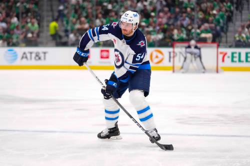 Julio Cortez / The Associated Press Files
                                Winnipeg Jets defenceman Dylan Samberg controls the puck against the Dallas Stars in a game Thursday, April 10.