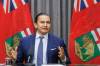 Premier Wab Kinew talks to the media prior to the Speech from the Throne for the third session of the 43rd Manitoba legislature on Tuesday afternoon. 251118 - Tuesday, November 18, 2025. (Mike Deal / Free Press)