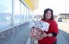 Ruth Bonneville / Free Press 
                                Christmas Cheer Board director Shawna Bell says the charity hopes to raise enough money to ship thousands of hampers to those in need