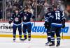 Fred Greenslade / THE CANADIAN PRESS
                                Winnipeg Jets defenceman Neal Pionk (second left) celebrates his power-play goal against the Columbus Blue Jackets Tuesday with his teammates.