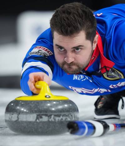 Darryl Dyck / THE CANADIAN PRESS FILES
                                Skip Matt Dunstone delivers a rock while playing Alberta-Jacobs during the final at the Brier, in Kelowna, B.C., on Sunday, March 9, 2025.