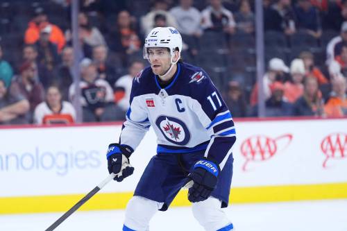 Matt Slocum / THE ASSOCIATED PRESS FILES
                                Winnipeg Jets captain Adam Lowry signed a five-year contract extension Wednesday with the club.