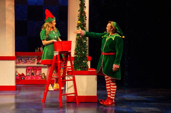 Jovie (Jade Repeta, left) is bah-humbug before meeting Buddy the Elf (Ryan Brown) in RMTC's production of Elf. (Dylan Hewlett photo)