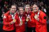 DARREN CALABRESE / THE CANADIAN PRESS
                                Team Homan, from left to right, Rachel Homan, Tracy Fleury, Emma Miskew, Sarah Wilkes pose after winning the Canadian Olympic curling trials over Team Black in Halifax on Saturday.