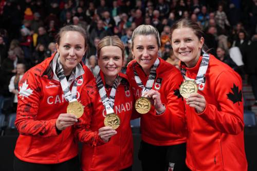 DARREN CALABRESE / THE CANADIAN PRESS
                                Team Homan, from left to right, Rachel Homan, Tracy Fleury, Emma Miskew, Sarah Wilkes pose after winning the Canadian Olympic curling trials over Team Black in Halifax on Saturday.
