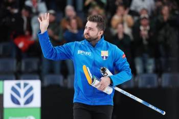 DARREN CALABRESE / THE CANADIAN PRESS
Team Dunstone skip Matt Dunstone acknowledges the crowd after losing to Team Jacobs in the Canadian Olympic curling trials final in Halifax on Saturday.