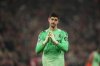 Real Madrid's goalkeeper Thibaut Courtois walks off the oitch after the Champions League soccer match between Liverpool and Real Madrid in Liverpool, England, Tuesday, Nov. 4, 2025. (AP Photo/Jon Super)