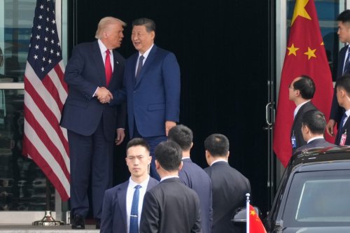 President Donald Trump left, and Chinese President Xi Jinping, shake hands before their U.S.-China summit talk at Gimhae International Airport in Busan, South Korea, Thursday, Oct. 30, 2025. (AP Photo/Mark Schiefelbein)