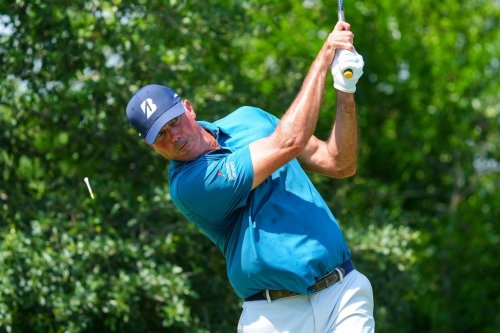 FILE -Matt Kuchar hits off the ninth tee during the first round of the Charles Schwab Challenge golf tournament at Colonial Country Club in Fort Worth, Texas, May 22, 2025. (AP Photo/LM Otero, File)