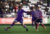 Pacific FC's Ayman Sellouf (21) runs with the ball while being watched by Atletico Ottawa's Ollie Bassett (10) during the first half of a Canadian Championship quarterfinal soccer match, in Langford, B.C., on Wednesday, May 29, 2024. THE CANADIAN PRESS/Darryl Dyck