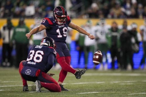 Montreal Alouettes' Jose Maltos Diaz (19) kicks a field goal as Montreal Alouettes' Joseph Zema (36) holds the ball against the Saskatchewan Roughriders during second half CFL football action at the 112th Grey Cup, in Winnipeg on Sunday, Nov. 16, 2025. THE CANADIAN PRESS/Darryl Dyck