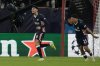PSV's Ricardo Pepi, left, celebrates after scoring his side's opening goal during a Champions League opening phase soccer match between Olympiacos and PSV in Piraeus port, near Athens, Greece, Tuesday, Nov. 4, 2025. (AP Photo/Thanassis Stavrakis)