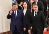 France's President Emmanuel Macron, right, and China's President Xi Jinping, left, walk during a state visit at the Great Hall of the People in Beijing Thursday, Dec. 4, 2025. (Adek Berry/Pool Photo via AP)