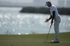 Aaron Rai of England reacts after missing a putt on the 8th hole during the final round of the Abu Dhabi Golf Championship in Abu Dhabi, United Arab Emirates, Sunday, Nov. 9, 2025. (AP Photo/Altaf Qadri)