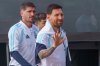 Argentina's Lionel Messi waves before a training session with the national team ahead of an international friendly soccer match against Angola in Elche, Spain, Thursday, Nov. 13, 2025. (AP Photo/Alberto Saiz)