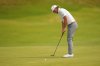 CORRECTS NATIONALITY TO AUSTRALIA NOT SOUTH AFRICA - FILE - Cameron Smith, of Australia, putts on the seventh green during the second round of the British Open golf championship at the Royal Portrush Golf Club in Portrush, Northern Ireland, July 18, 2025. (AP Photo/Francisco Seco, File)