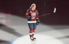 Montreal Victoire's Marie-Philip Poulin salutes the crowd as she's introduced ahead of their PWHL hockey game against the Ottawa Charge in Laval, Que., Saturday, Nov. 30, 2024. THE CANADIAN PRESS/Graham Hughes