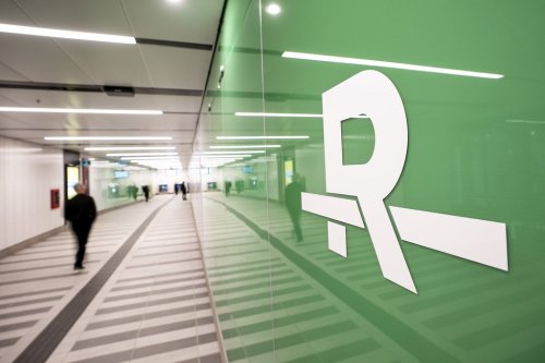 People walk toward the REM light rail system at McGill station, in Montreal, Monday, Nov. 17, 2025. THE CANADIAN PRESS/Christopher Katsarov