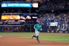 Seattle Mariners' Josh Naylor rounds the bases after hitting a solo home run against the Toronto Blue Jays during the sixth inning in Game 6 of baseball's American League Championship Series, Sunday, Oct. 19, 2025, in Toronto. (AP Photo/David J. Phillip)