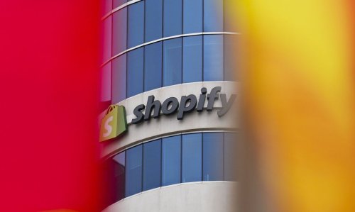 Shopify Inc. signage is shown in Ottawa on Tuesday, May 3, 2022. Shopify Inc. reported US$828 million in net income for its third quarter, up from US$718 million in the same quarter last year, as its revenue rose 26 per cent. THE CANADIAN PRESS/Sean Kilpatrick
