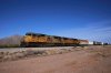 FILE - A Union Pacific freight train travels along the tracks April 17, 2025, in Eloy, Ariz. (AP Photo/Ross D. Franklin, File)