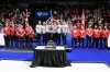 Members of the Scotland team lift the trophy as they stand alongside silver medallists Switzerland and bronze medallists Canada at the BKT World Men's Curling Championship in Moose Jaw, Sask., on April 6, 2025. THE CANADIAN PRESS/Chris Young