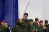 Venezuelan President Nicolas Maduro brandishes a sword said to have belonged to independence hero Simon Bolivar during a civic-military event at the military academy in Caracas, Venezuela, Tuesday, Nov. 25, 2025. (AP Photo/Ariana Cubillos)