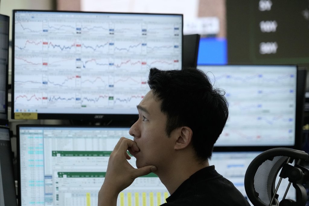 Wall Street scrambles back from a big morning loss as Nvidia and ...